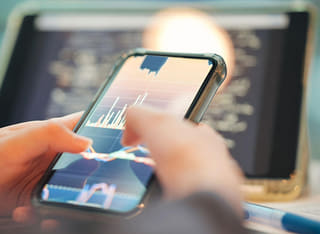Investor reviewing a clear fund withdrawal and transfer process